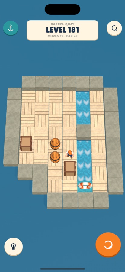 Level 181, Barrel Quay: two barrels and two crates on a pier beside a flowing channel with a buoy at its end